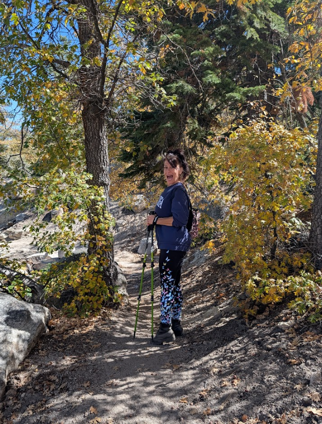 happy person hiking for wellness and physical activity